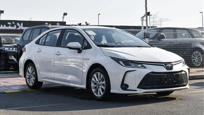 Новый Toyota Corolla Sporty XII (E210) Рестайлинг, 1.8 л, 2024 в Дубае от Atlantis Motors FZE Белый цвет. Китайская | AUTO.AE