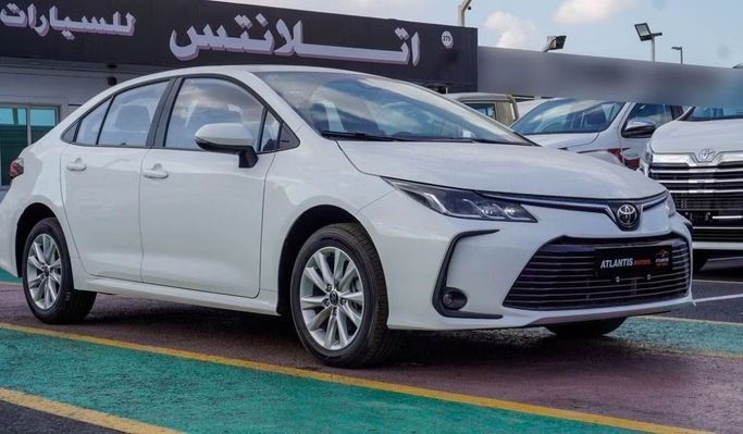 Новый Toyota Corolla Sporty XII (E210) Рестайлинг, 2.0 л, 2024 в Дубае от Atlantis Motors FZE Белый цвет. GCC | AUTO.AE