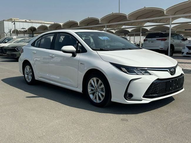 New Toyota Corolla XII (E210), 1.8 l, 2025 in Dubai by AL SHERAA AL MALAKI, White color. Chinese Specs | AUTO.AE