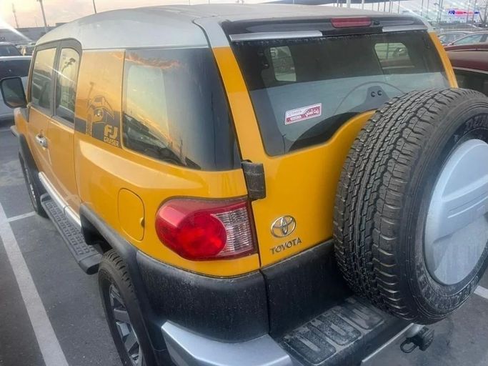 New Toyota FJ Cruiser, 4.0 l, 2023 in Dubai by Mohamed Hakim Motors, Yellow color. GCC Specs | AUTO.AE
