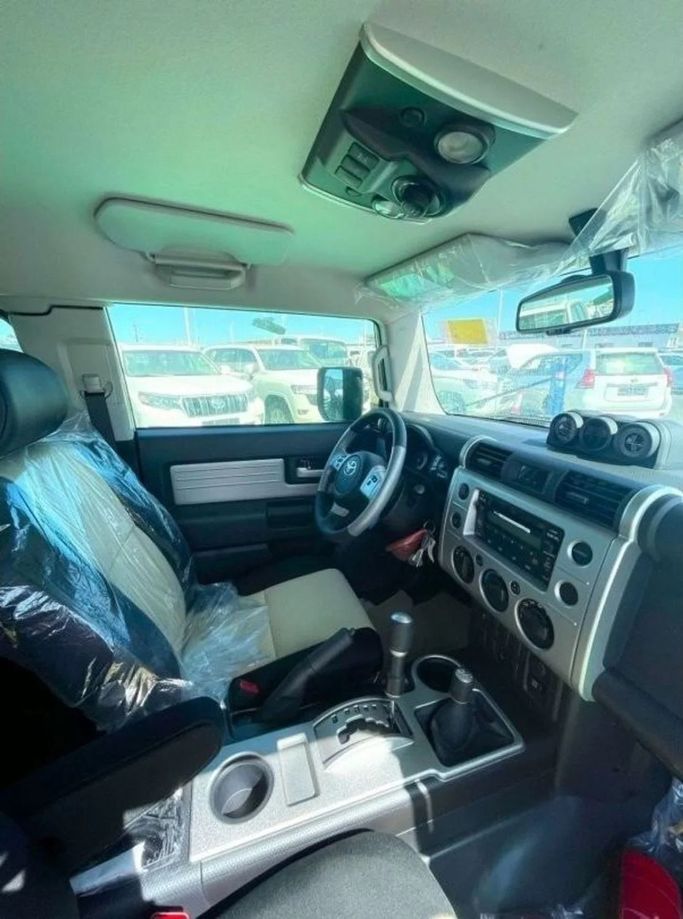 New Toyota FJ Cruiser, 4.0 l, 2023 in Dubai by Mohamed Hakim Motors, Beige color. GCC Specs | AUTO.AE