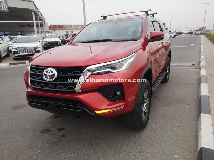 Used Toyota Fortuner II Facelift, 2.8 l, 2021 in Dubai by Alhamd Motors, Red color. Other | AUTO.AE