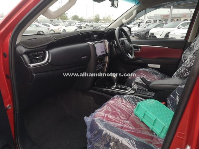 Used Toyota Fortuner II Facelift, 2.8 l, 2021 in Dubai by Alhamd Motors, Red color. Other | AUTO.AE