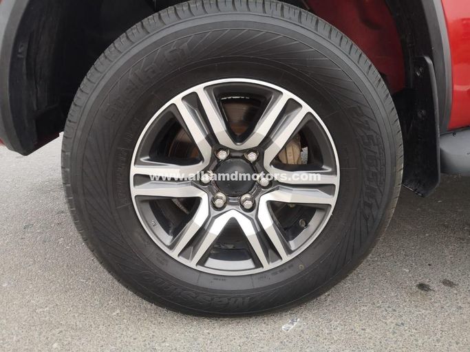 Used Toyota Fortuner II Facelift, 2.8 l, 2021 in Dubai by Alhamd Motors, Red color. Other | AUTO.AE