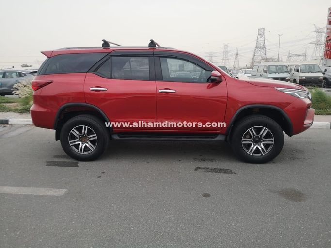 Used Toyota Fortuner II Facelift, 2.8 l, 2021 in Dubai by Alhamd Motors, Red color. Other | AUTO.AE