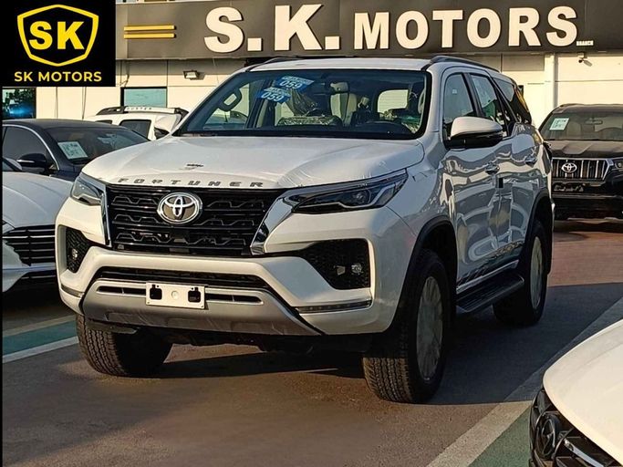 New Toyota Fortuner II Facelift, 4.0 l, 2024 in Dubai by SK Motors, White color. GCC Specs | AUTO.AE
