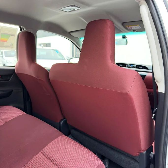 New Toyota Hilux VIII Facelift, 2.8 l, 2025 in Dubai by Sola Motors, White color. GCC Specs | AUTO.AE