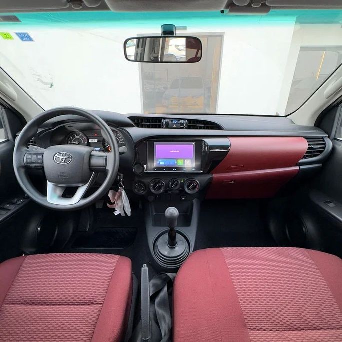 New Toyota Hilux VIII Facelift, 2.8 l, 2025 in Dubai by Sola Motors, White color. GCC Specs | AUTO.AE