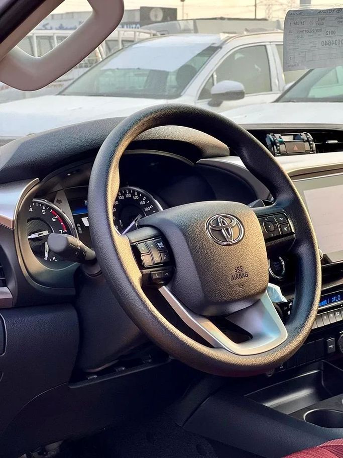 New Toyota Hilux VIII Facelift, 4.0 l, 2025 in Dubai by ANDIAMO MOTORS FZE, White color. GCC Specs | AUTO.AE