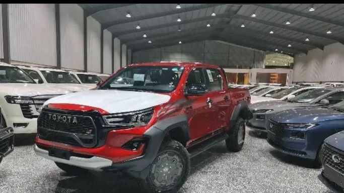 New Toyota Hilux VIII Facelift, 4.0 l, 2024 in Dubai by Mohamed Hakim Motors, Red color. GCC Specs | AUTO.AE