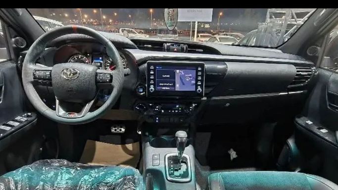 New Toyota Hilux VIII Facelift, 4.0 l, 2024 in Dubai by Mohamed Hakim Motors, Red color. GCC Specs | AUTO.AE