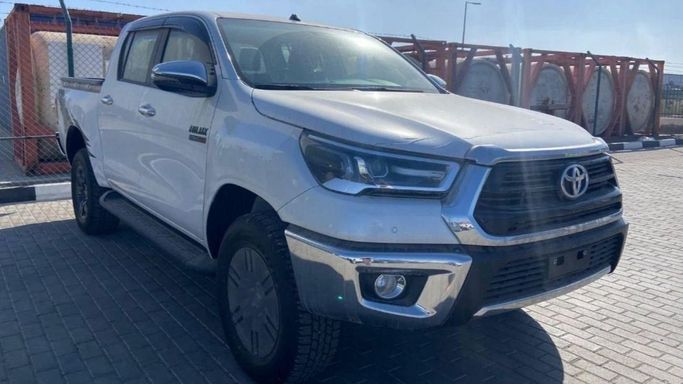 New Toyota Hilux VIII Facelift, 2.7 l, 2023 in Dubai by Mohamed Hakim Motors, White color. GCC Specs | AUTO.AE