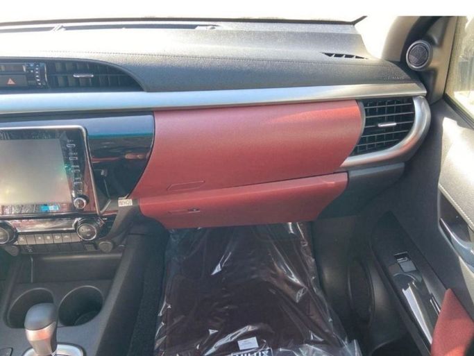 New Toyota Hilux VIII Facelift, 2.7 l, 2023 in Dubai by Mohamed Hakim Motors, White color. GCC Specs | AUTO.AE