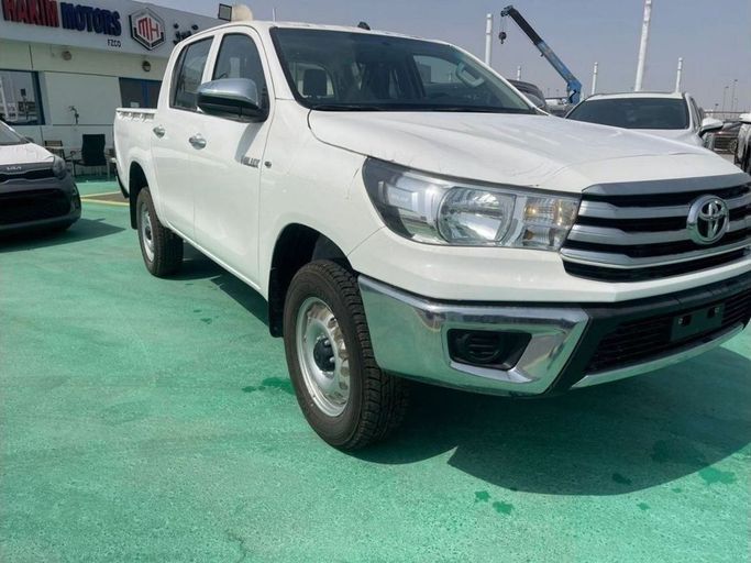 New Toyota Hilux VIII Facelift, 2.4 l, 2023 in Dubai by Mohamed Hakim Motors, White color. GCC Specs | AUTO.AE