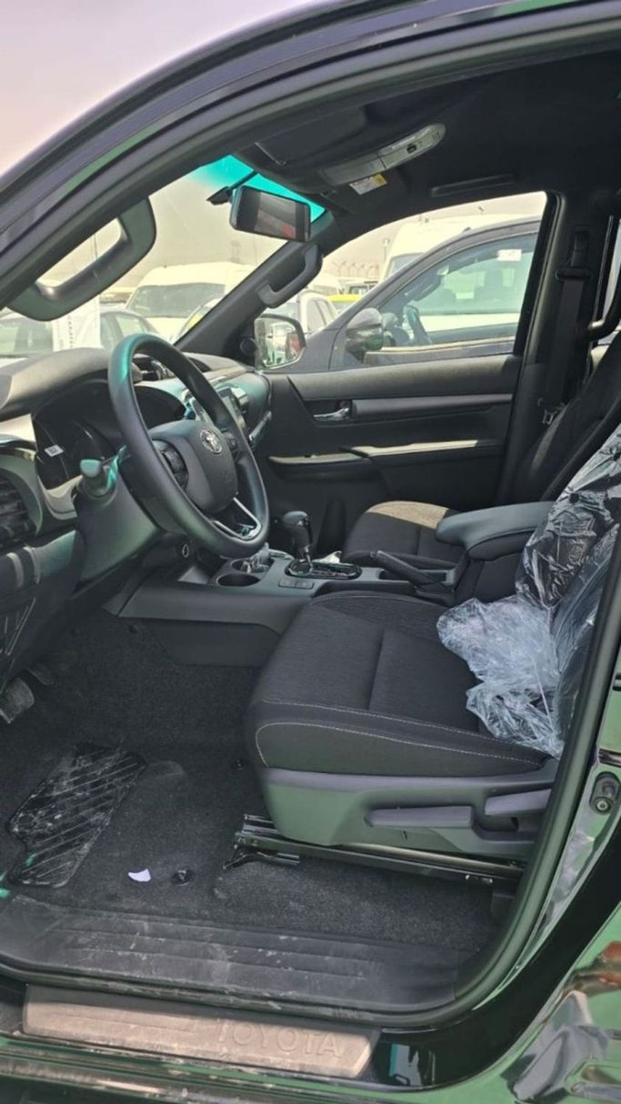 New Toyota Hilux VIII Facelift, 4.0 l, 2025 in Dubai by Mohamed Hakim Motors, Black color. GCC Specs | AUTO.AE