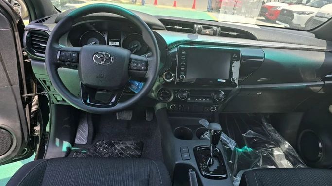 New Toyota Hilux VIII Facelift, 4.0 l, 2025 in Dubai by Mohamed Hakim Motors, Black color. GCC Specs | AUTO.AE