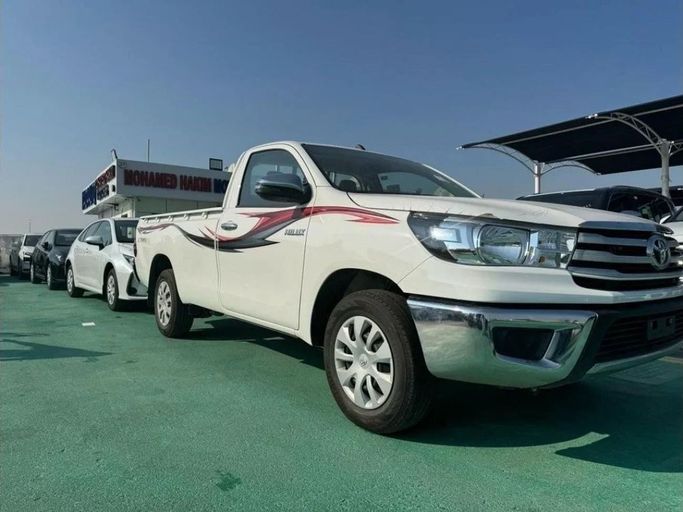 New Toyota Hilux VIII Facelift 2, 2.7 l, 2025 in Dubai by Mohamed Hakim Motors, White color. GCC Specs | AUTO.AE
