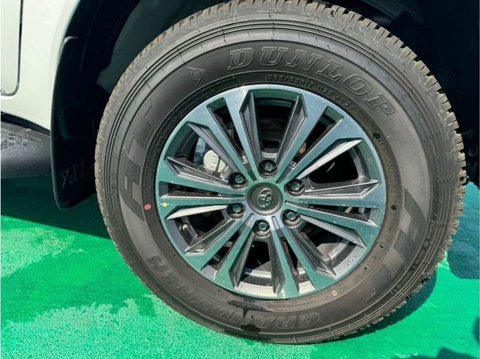 New Toyota Hilux VIII Facelift 2, 2.4 l, 2025 in Dubai by Mohamed Hakim Motors, White color. GCC Specs | AUTO.AE