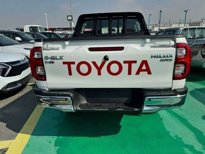 New Toyota Hilux VIII Facelift 2, 2.4 l, 2025 in Dubai by Mohamed Hakim Motors, White color. GCC Specs | AUTO.AE