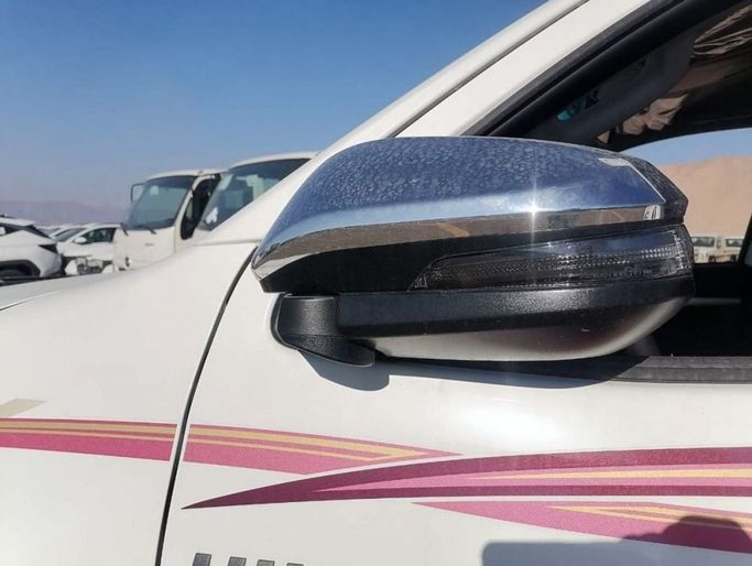 New Toyota Hilux VIII Facelift, 2.4 l, 2023 in Dubai by Mohamed Hakim Motors, White color. GCC Specs | AUTO.AE