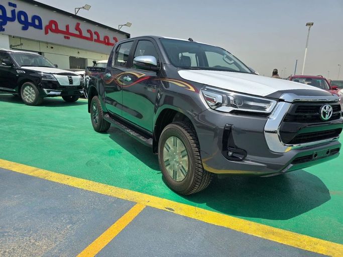 New Toyota Hilux VIII Facelift, 2.4 l, 2025 in Dubai by Mohamed Hakim Motors, Grey color. GCC Specs | AUTO.AE