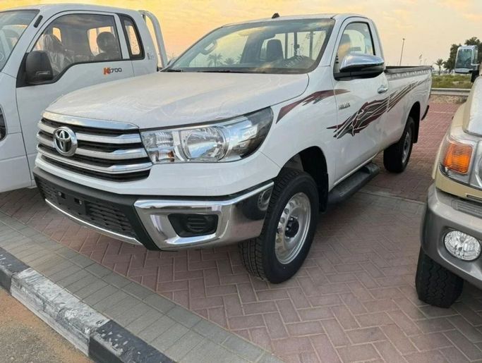 New Toyota Hilux VIII Facelift 2, 2.7 l, 2025 in Dubai by Mohamed Hakim Motors, White color. GCC Specs | AUTO.AE