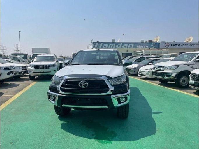 New Toyota Hilux VIII Facelift, 2.4 l, 2023 in Dubai by Mohamed Hakim Motors, Black color. GCC Specs | AUTO.AE