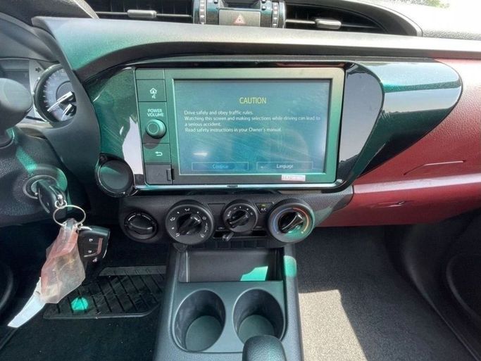 New Toyota Hilux VIII Facelift, 2.4 l, 2023 in Dubai by Mohamed Hakim Motors, Black color. GCC Specs | AUTO.AE