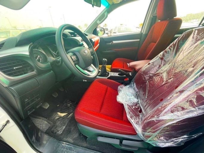 New Toyota Hilux VIII Facelift, 2.8 l, 2023 in Dubai by Mohamed Hakim Motors, White color. GCC Specs | AUTO.AE