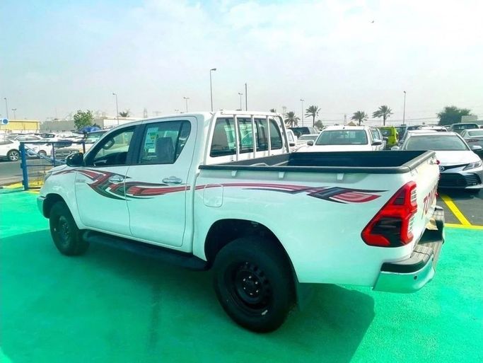 New Toyota Hilux VIII Facelift, 2.8 l, 2023 in Dubai by Mohamed Hakim Motors, White color. GCC Specs | AUTO.AE