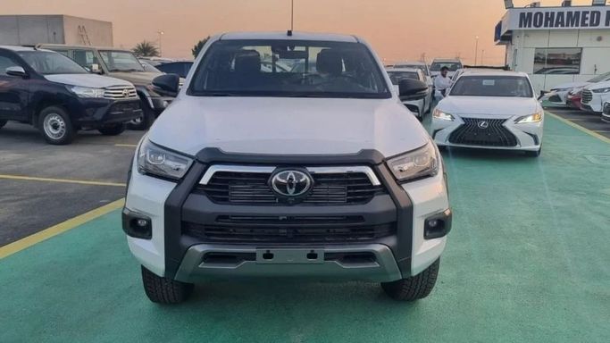 New Toyota Hilux VIII Facelift, 2.8 l, 2023 in Dubai by Mohamed Hakim Motors, White color. GCC Specs | AUTO.AE