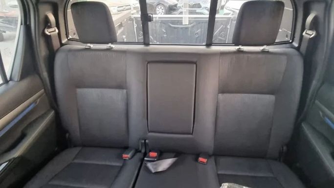 New Toyota Hilux VIII Facelift, 2.8 l, 2023 in Dubai by Mohamed Hakim Motors, White color. GCC Specs | AUTO.AE