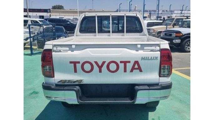 New Toyota Hilux VIII Facelift, 2.7 l, 2023 in Dubai by Mohamed Hakim Motors, White color. GCC Specs | AUTO.AE
