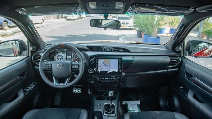 New Toyota Hilux VIII Facelift, 4.0 l, 2023 in Dubai by Mohamed Hakim Motors, Red color. GCC Specs | AUTO.AE