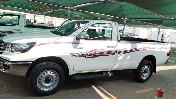 New Toyota Hilux Extra Cab VIII Facelift, 2.8 l, 2024 in Dubai by Mohamed Hakim Motors, White color. GCC Specs | AUTO.AE