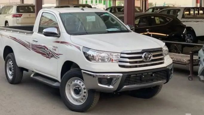 New Toyota Hilux VIII Facelift 2, 2.8 l, 2024 in Dubai by Mohamed Hakim Motors, White color. GCC Specs | AUTO.AE