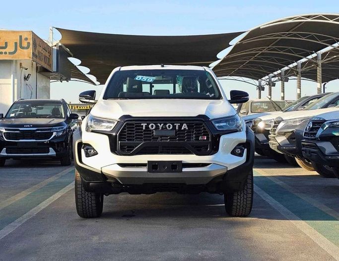 New Toyota Hilux VIII Facelift, 4.0 l, 2025 in Dubai by SK Motors, White color. GCC Specs | AUTO.AE
