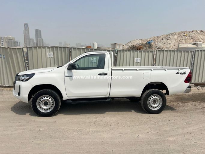 Used Toyota Hilux Extra Cab VIII Facelift, 2.8 l, 2021 in Dubai by Alhamd Motors, White color. Other | AUTO.AE