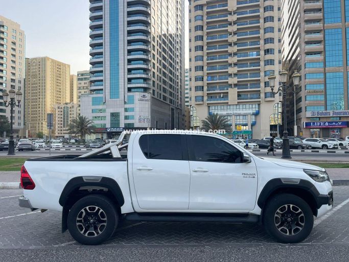 Used Toyota Hilux VIII Facelift, 2.8 l, 2020 in Dubai by Alhamd Motors, White color. Other | AUTO.AE
