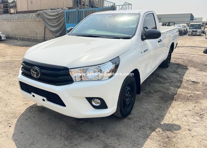 Подержанный Toyota Hilux Extra Cab VIII Рестайлинг, 2.4 л, 2023 в Дубае от Alhamd Motors Белый цвет. Other | AUTO.AE