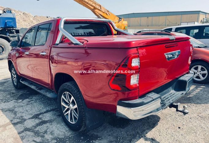 Подержанный Toyota Hilux VIII, 2.4 л, 2016 в Дубае от Alhamd Motors Красный цвет. Other | AUTO.AE