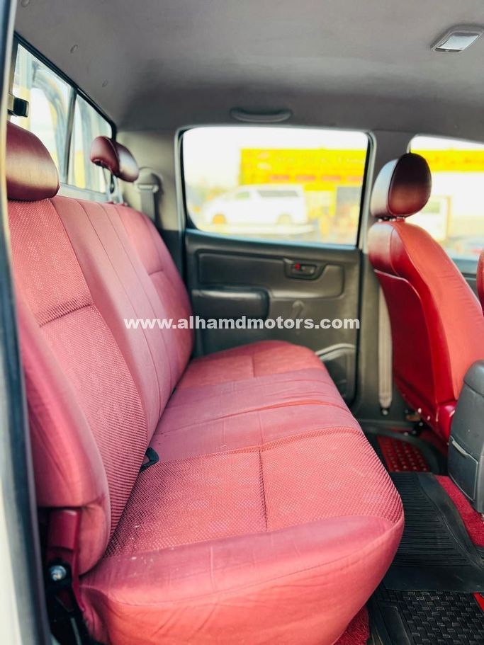 Used Toyota Hilux VII Facelift, 2.7 l, 2012 in Dubai by Alhamd Motors, White color. GCC Specs | AUTO.AE