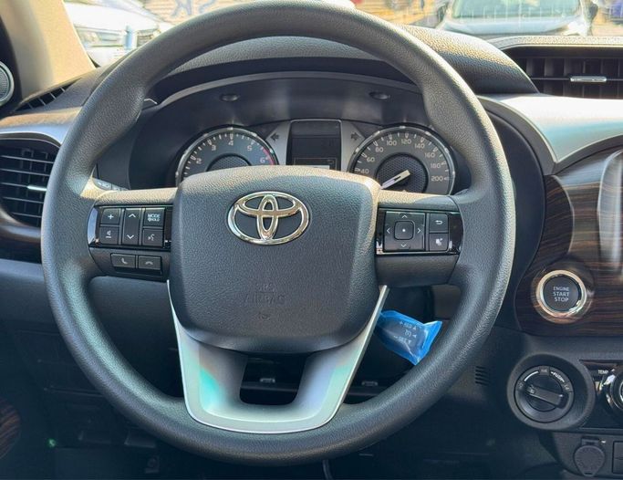 New Toyota Hilux VIII Facelift, 2.7 l, 2025 in Dubai by SK Motors, Black color. GCC Specs | AUTO.AE