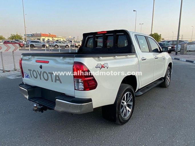 Подержанный Toyota Hilux VIII, 2.8 л, 2017 в Дубае от Alhamd Motors Белый цвет. Other | AUTO.AE