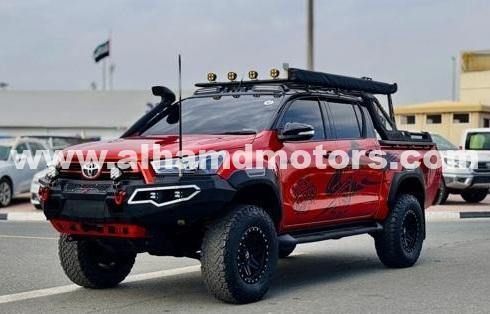 Подержанный Toyota Hilux VIII, 2.8 л, 2017 в Дубае от Alhamd Motors Оранжевый цвет. Other | AUTO.AE