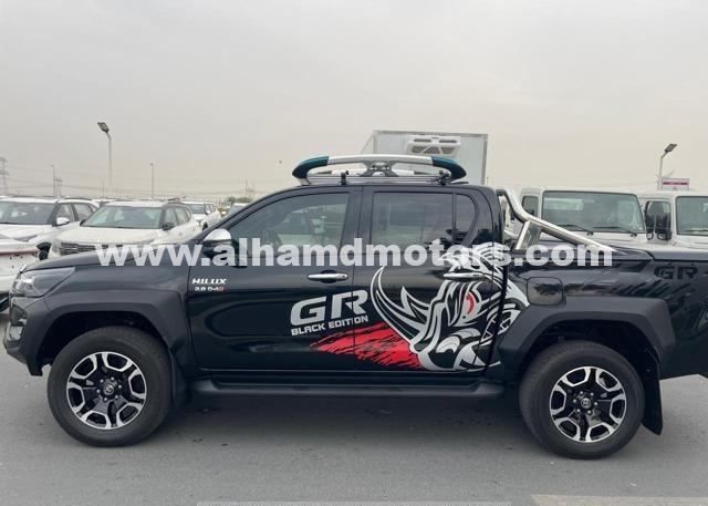 Used Toyota Hilux VIII Facelift, 2.8 l, 2023 in Dubai by Alhamd Motors, Black color. Other | AUTO.AE