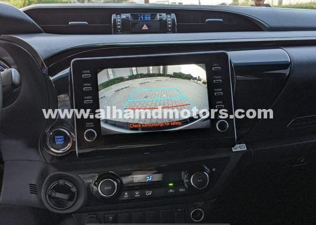 Used Toyota Hilux VIII Facelift, 4.0 l, 2021 in Dubai by Alhamd Motors, White color. Other | AUTO.AE