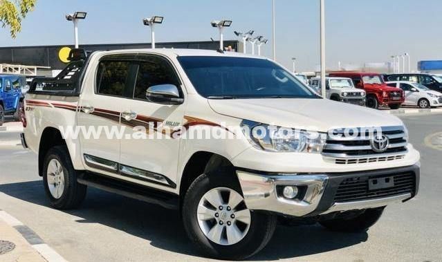Подержанный Toyota Hilux VIII, 2.7 л, 2020 в Дубае от Alhamd Motors Белый цвет. Other | AUTO.AE