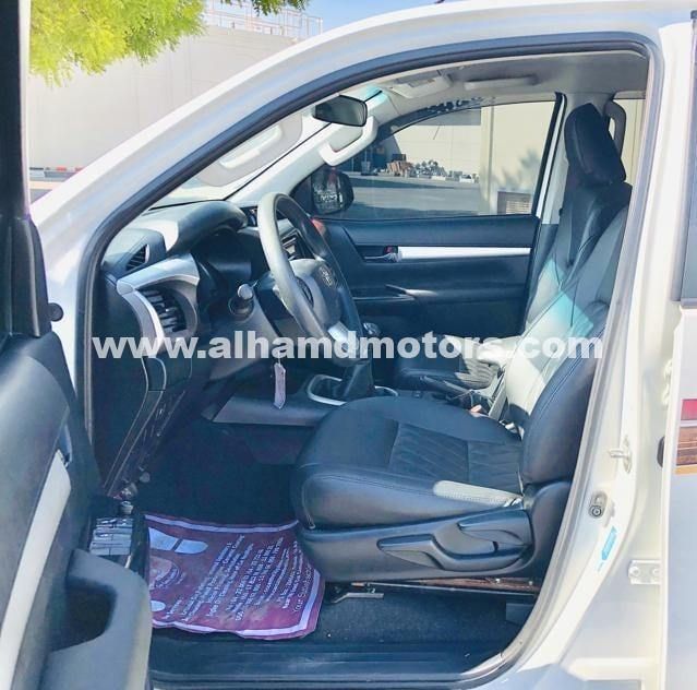 Подержанный Toyota Hilux VIII, 2.7 л, 2020 в Дубае от Alhamd Motors Белый цвет. Other | AUTO.AE