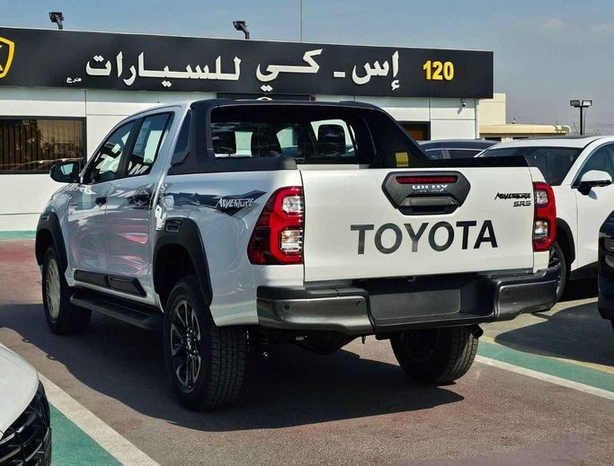 New Toyota Hilux VIII Facelift, 4.0 l, 2024 in Dubai by SK Motors, White color. GCC Specs | AUTO.AE